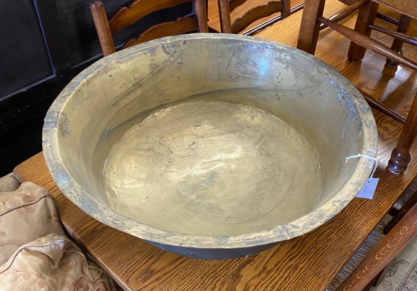 A French circular brass milk pail, diameter 69cm, height 24cm